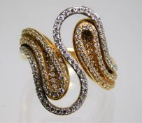 An 18ct two colour gold ring set with diamonds siz