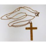 An early 20thC. 9ct rose gold necklace & cross set