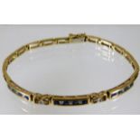 A 9ct gold diamond & sapphire bracelet 10.4g