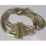 A heavy gauge silver mesh strand bracelet
