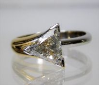 An 18ct two colour gold ring set with an unusual t