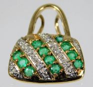 A 9ct gold emerald & diamond handbag pendant 2.8g
