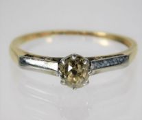 A yellow metal antique ring set with old cut diamo