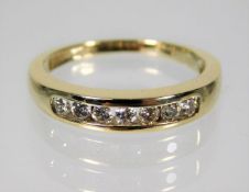A yellow metal ring, tests as 9ct gold, set with a