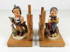 A pair of Goebel Hummel figurative bookends