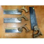 Two brass topped carpenters saws & two others