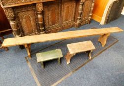 A six foot long bench & two small stools