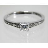 An 18ct diamond ring set with approx. 0.33ct princ