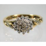 A 9ct gold cluster ring set with small diamonds si