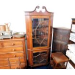 A substantial c.1900 glazed mahogany corner cabine