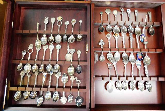 Two cases of silver plated collectors spoons