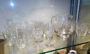 A water jug & six whisky glasses twinned with othe
