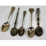 Five silver & white metal spoons