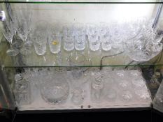 A quantity of cut glass drinking glasses twinned w