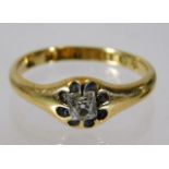 An 18ct gold antique ring set with cushion style c