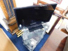 A modern Panasonic television set with stand