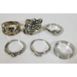 Six decorative silver fashion rings