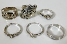 Six decorative silver fashion rings