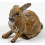 An early 20thC. small cold painted model of rabbit