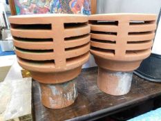 Two terracotta chimney cowls