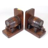 A pair of early 20thC. oak barrel bookends