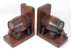 A pair of early 20thC. oak barrel bookends