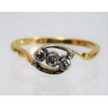 An art deco period 18ct gold ring with platinum mounted trilogy of diamonds size M/N 2.1g