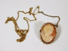 A 9ct gold mounted cameo & a yellow metal chain a/