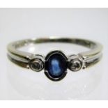 A 9ct white gold diamond & sapphire ring size N/O