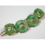 A Victorian 9ct gold hair slide set with Chinese jade signed J.B & Co. believed to be by John Brogde