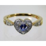 A 9ct gold ring with diamond & tanzanite on a hear