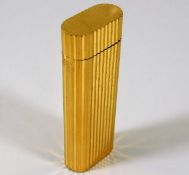 A Cartier gold plated lighter