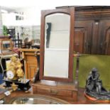 An early 20thC. mahogany dressing table mirror with drawer twinned with an oval mirror