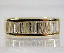 An 18ct gold ring set with approx. 1ct tapered baguette diamonds size L 6.1g