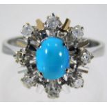 An 18ct white gold ring set with diamond & turquoi