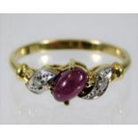 A 14ct gold ring set with diamond & ruby 2.1g size