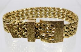 A 9ct gold belt & buckle style bracelet 32.4g
