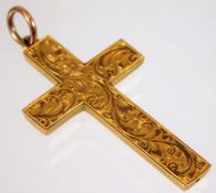 A 9ct gold cross pendant with carved decor 2.3g