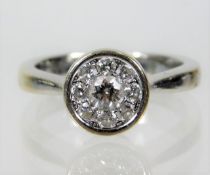 An 18ct white gold daisy style ring approx. 0.5ct