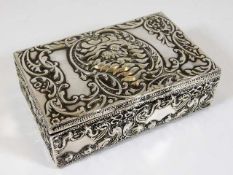 An embossed silver ring box