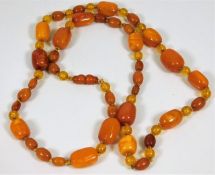 A 19thC. set of amber beads 51.3g