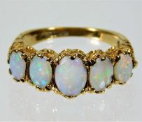 A 9ct gold ring set with opal 3.4g size K