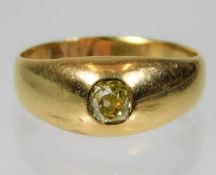 A yellow metal ring, tests as 18ct gold, set with