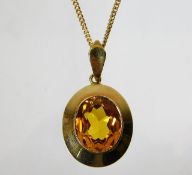 A 14ct gold citrine pendant & chain 6.4g