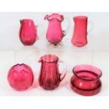 Six pieces of cranberry glass, chip to spout of to