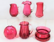 Six pieces of cranberry glass, chip to spout of to