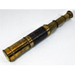 A three draw brass telescope