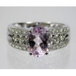 A 9ct gold ring set with diamond & kunzite 4g size O £100-150