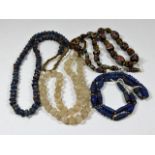 Four vintage & antique necklaces including Islamic