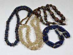 Four vintage & antique necklaces including Islamic